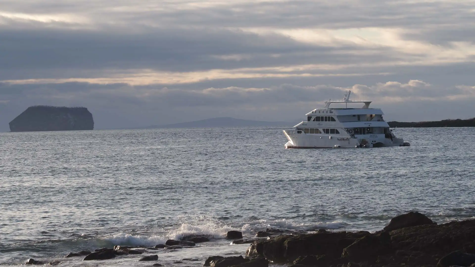EcoGalaxy catamaran sailing through the Galapagos Islands ocean